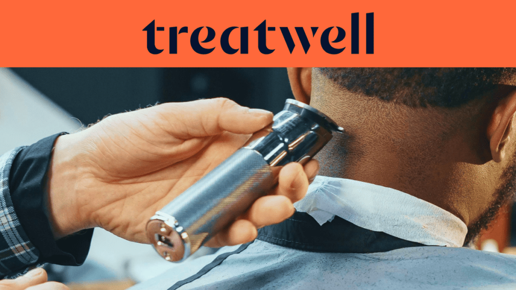 A close-up of a barber using a professional silver electric trimmer to neaten the neckline of a client. An orange banner at the top displays the Treatwell logo.