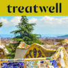 A scenic view of Barcelona from Park Güell, featuring Antoni Gaudís iconic colourful mosaic benches and fairytale-style spires in the foreground, with the city and sea beyond. A large yellow banner at the top displays the "treatwell" logo.