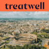 A high-angle aerial view of Rome, featuring the iconic Colosseum in the foreground. The historic city spans out towards the horizon under a cloudy sky. A large orange banner at the top displays the “treatwell” logo.